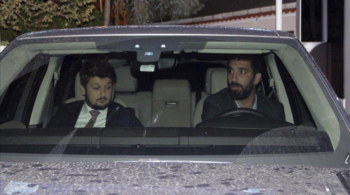 jdomenech45427682 barcelona s turkish player arda turan  right  leaves a polic181015164848