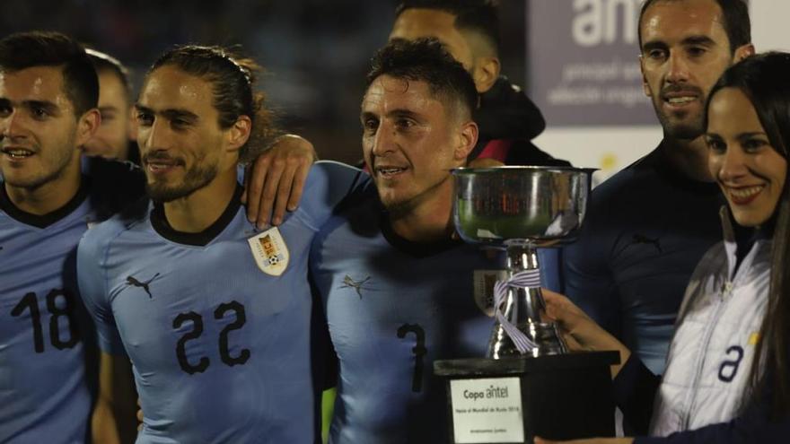 Maxi, a la izquierda, tras la finalización del partido.