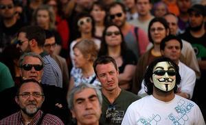 Uns manifestants de la concentració de ’¡Democràcia Real JA!’ de Madrid, aquest diumenge.