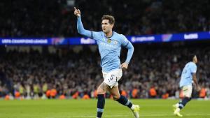 John Stones celebra un gol con el Manchester City en la Champions League