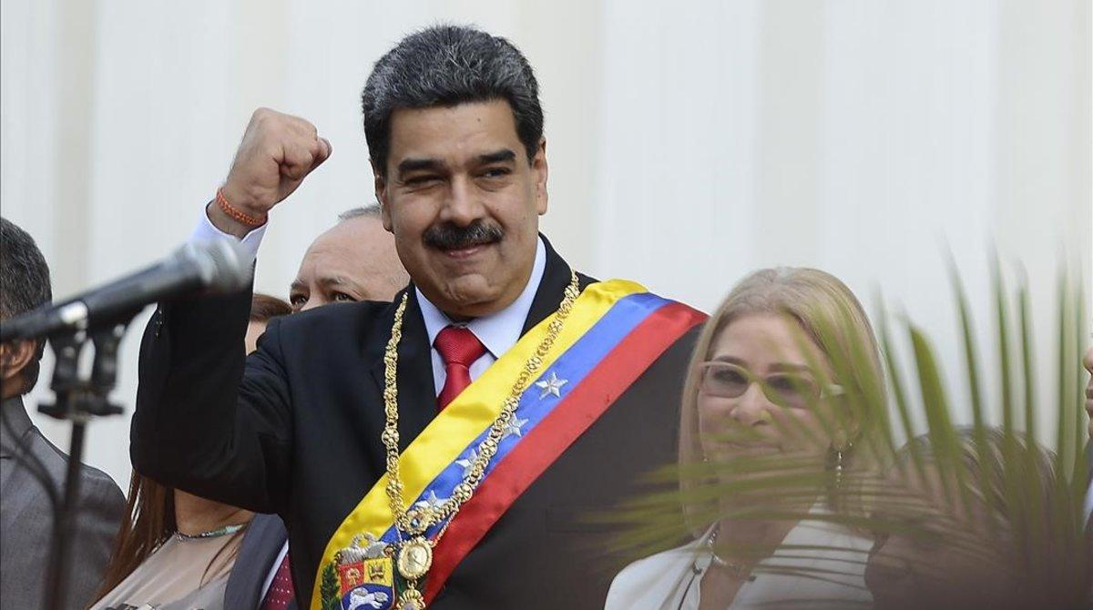 undefined51395058 venezuela s president nicolas maduro  waves as he arrives at191215235045