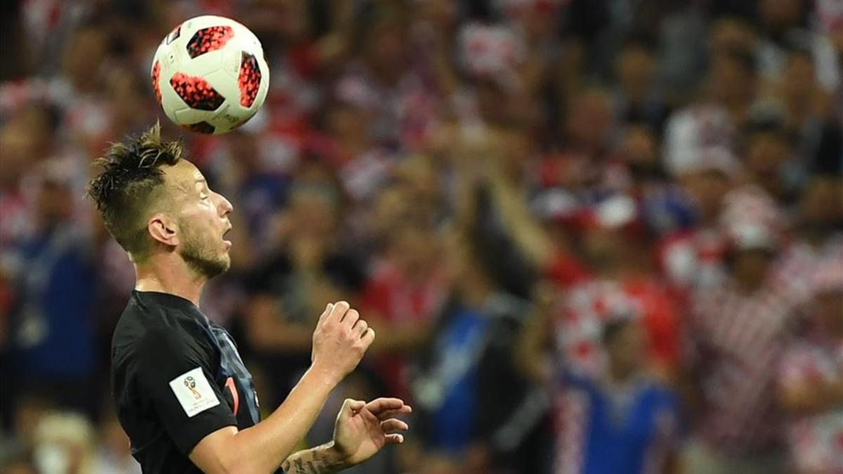 undefinedcroatia s midfielder ivan rakitic heads the ball d180711225806