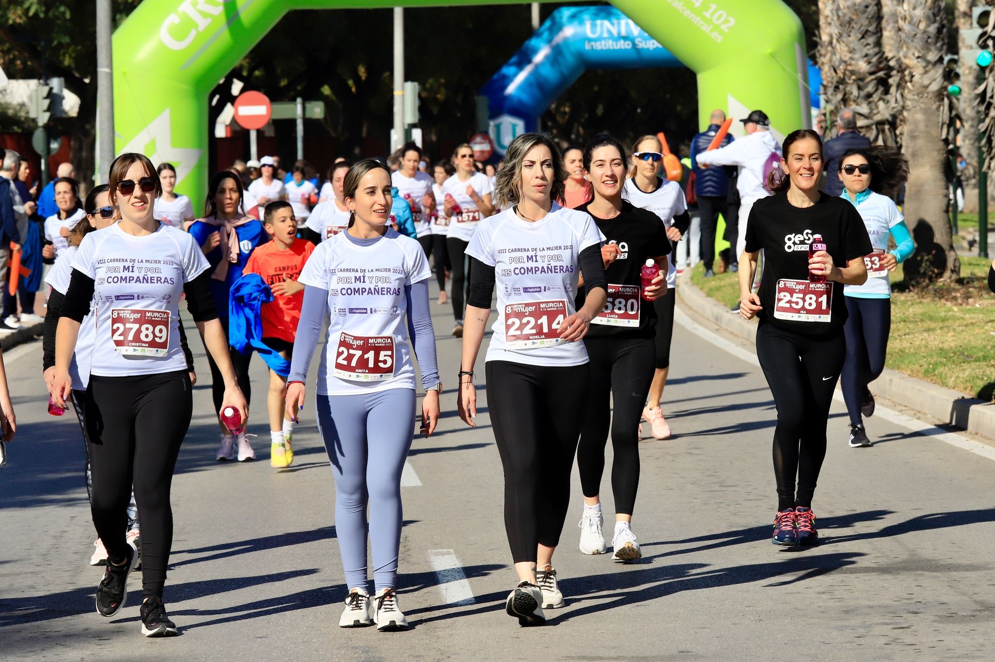 La salida y el recorrido de la Carrera de la Mujer 'inmortalizados' en imágenes