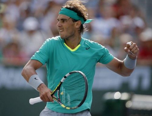 Nadal of Spain celebrates breaking the serve of Del Potro of Argentina at the BNP Paribas Open tennis tournament in Indian Wells, California