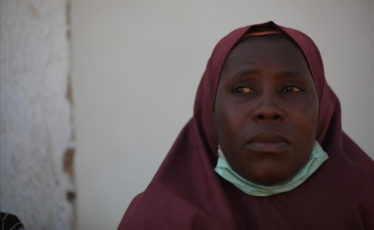 A woman whose son was abducted looks on inside the Government Science where gunmen abducted students in Kankara  in northwestern Katsina state  Nigeria December 15  2020  - Boko Haram on Tuesday claimed the abduction of hundreds of students  marking its first attack in northwestern Nigeria since the jihadist uprising began more than ten years ago  (Photo by Kola Sulaimon   AFP)