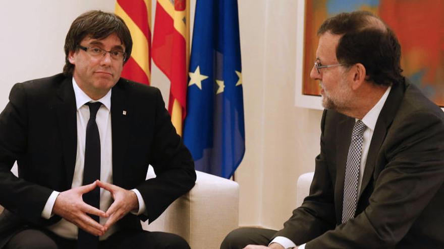 Puigdemont y Rajoy en una reunión.