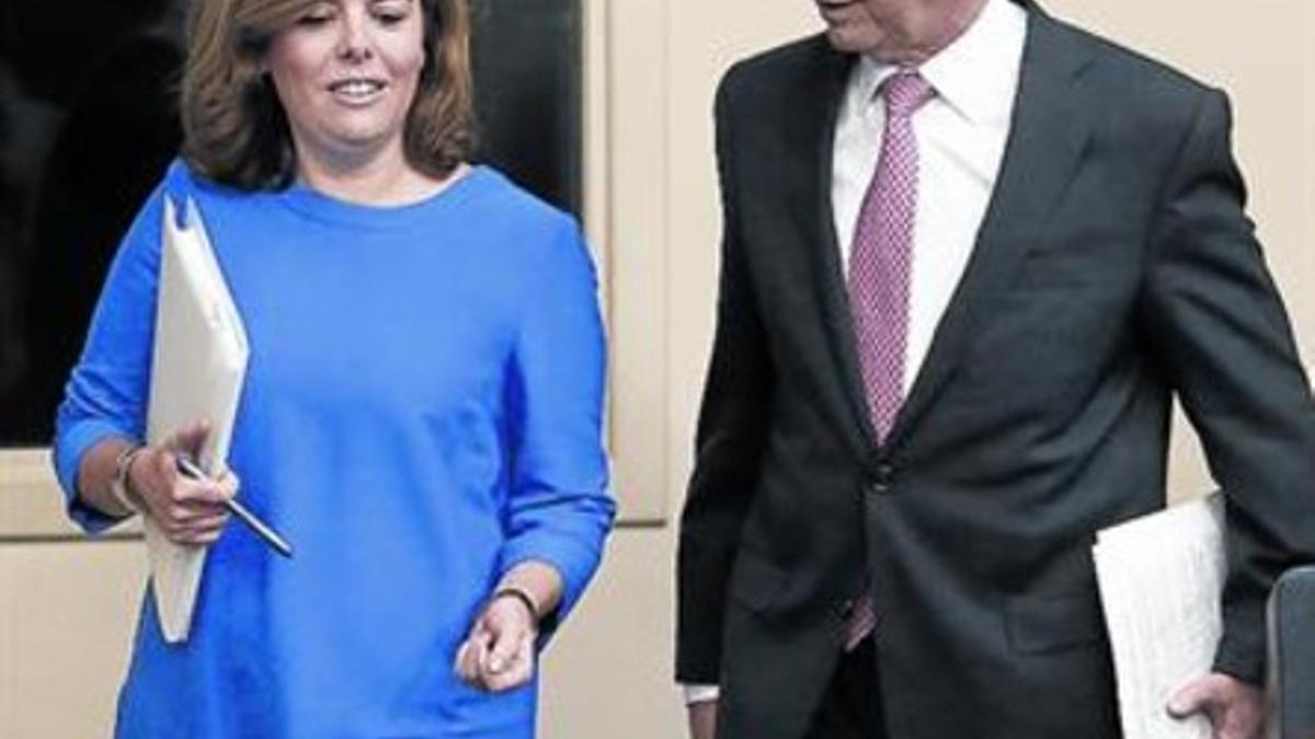 Santamaría y Montoro, tras el Consejo de Ministros de ayer.