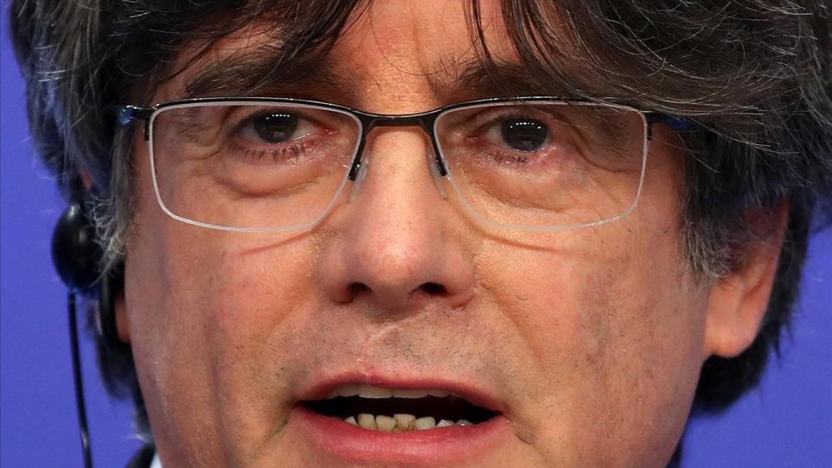 Catalan MEP Carles Puigdemont speaks at a news conference after the European Parliament voted to waive his immunity in Brussels  Belgium March 9  2021  REUTERS Yves Herman