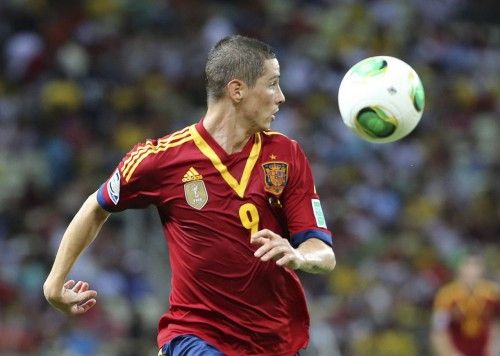 Spain's Fernando Torres looks at the ball during their Confederations Cup Group B soccer match against Nigeria at the Estadio Castelao in Fortaleza