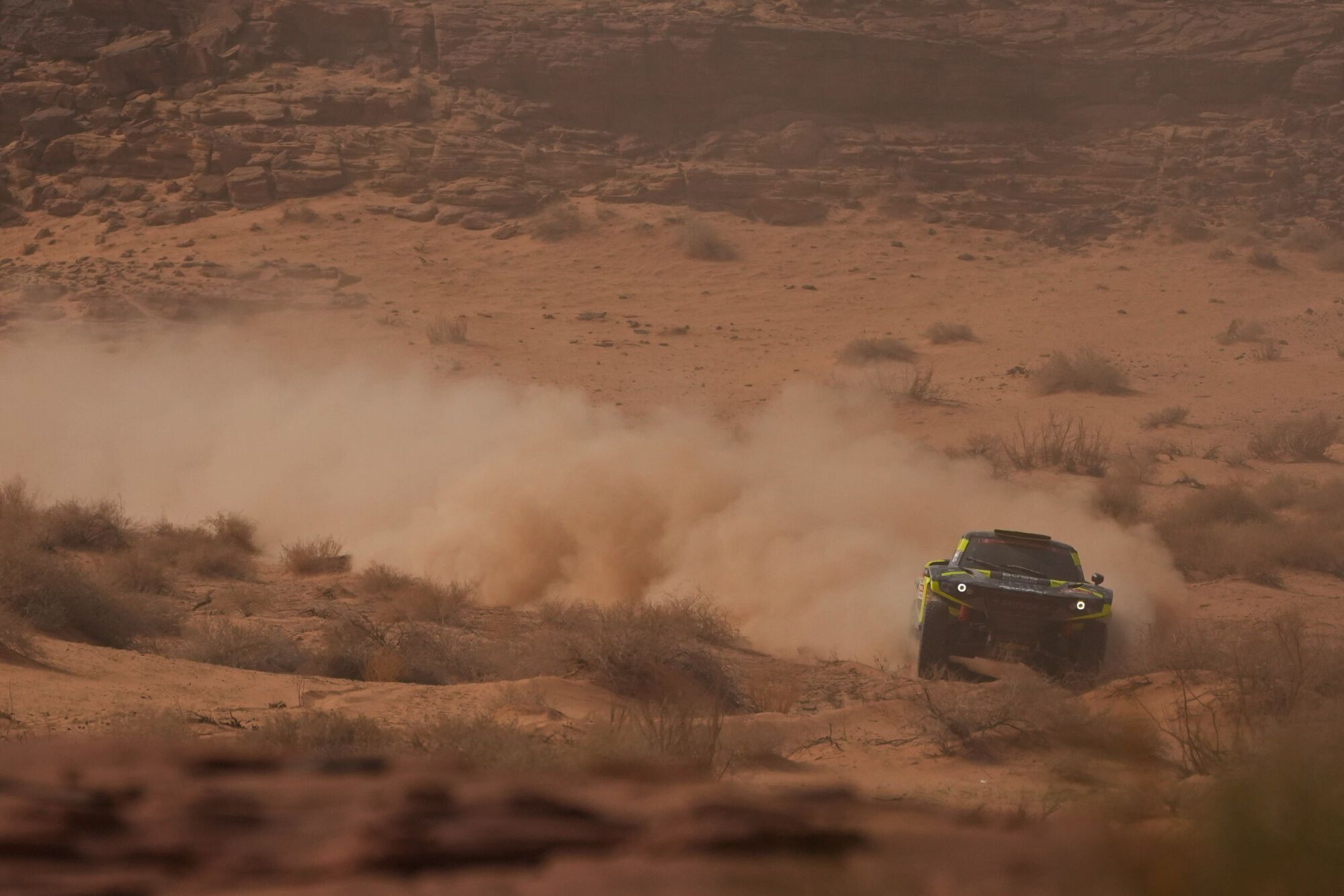 Driver Janus Van Kasteren and co-driver Marcel Snijders compete during the third stage of the Dakar Rally with a start and finish in Alula, Saudi Arabia, Tuesday, Jan. 6, 2026. (AP Photo/Thibault Camus)