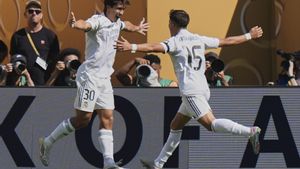 Real Madrids Gonzalo Garcia, left, and Arda Guler celebrate after Garcia scored a goal against Borussia Dortmund during the first half of a Club World Cup quarterfinal soccer match, Saturday, July 5, 2025 in East Rutherford, N.J. (AP Photo/Frank Franklin II). EDITORIAL USE ONLY/ONLY ITALY AND SPAIN
