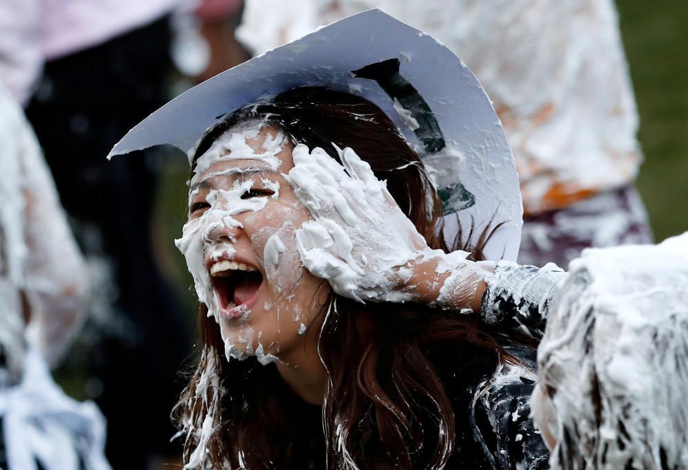 Students from St Andrews University are covered ...