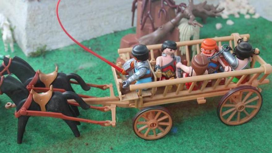 atención al detalle. Un carro romano con esclavos a bordo.