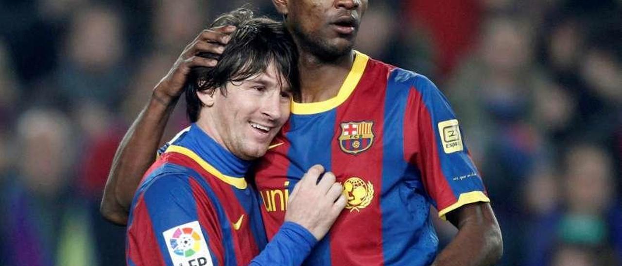 Abidal y Messi, en su etapa de compañeros en el Barcelona, en 2011.