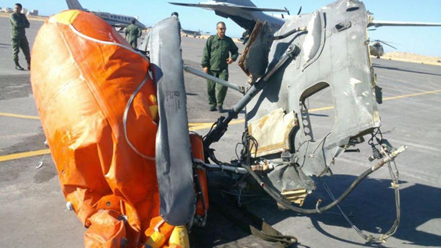 Los buzos tratan de recuperar al último de los tres fallecidos en el helicóptero