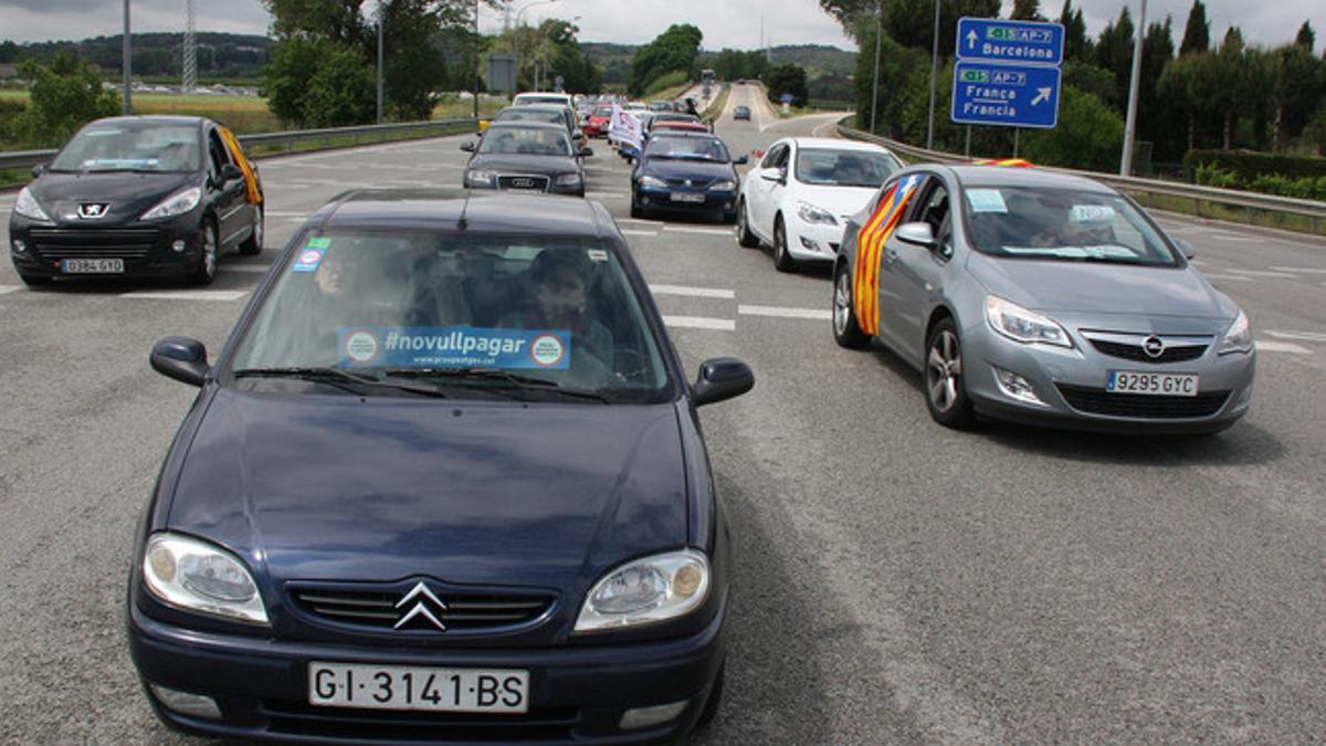 Protesta en el peaje de Girona sur, en la AP-7.