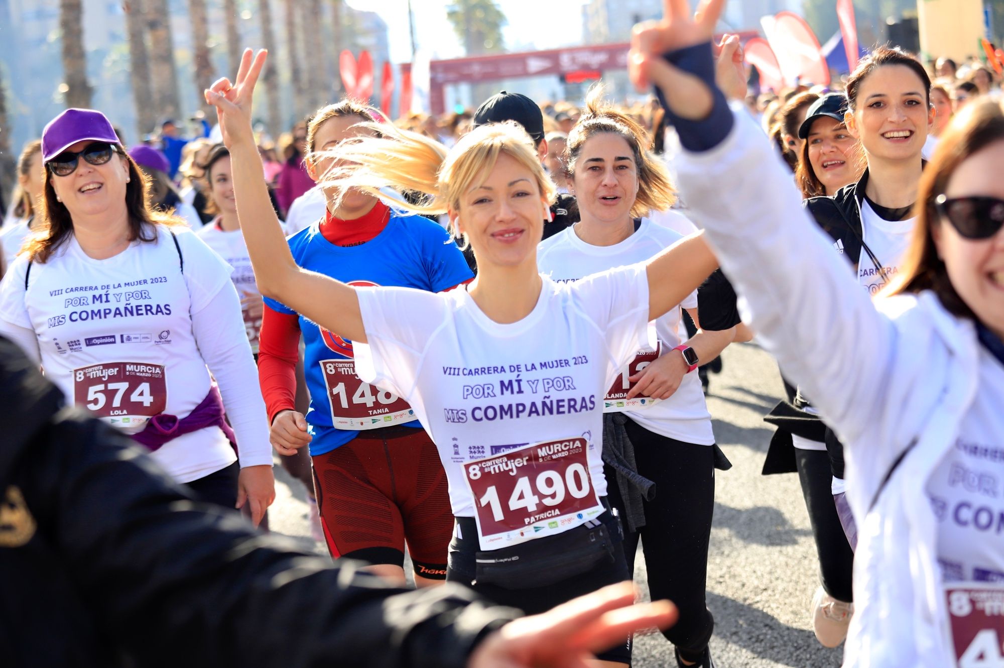 La salida y el recorrido de la Carrera de la Mujer 'inmortalizados' en imágenes