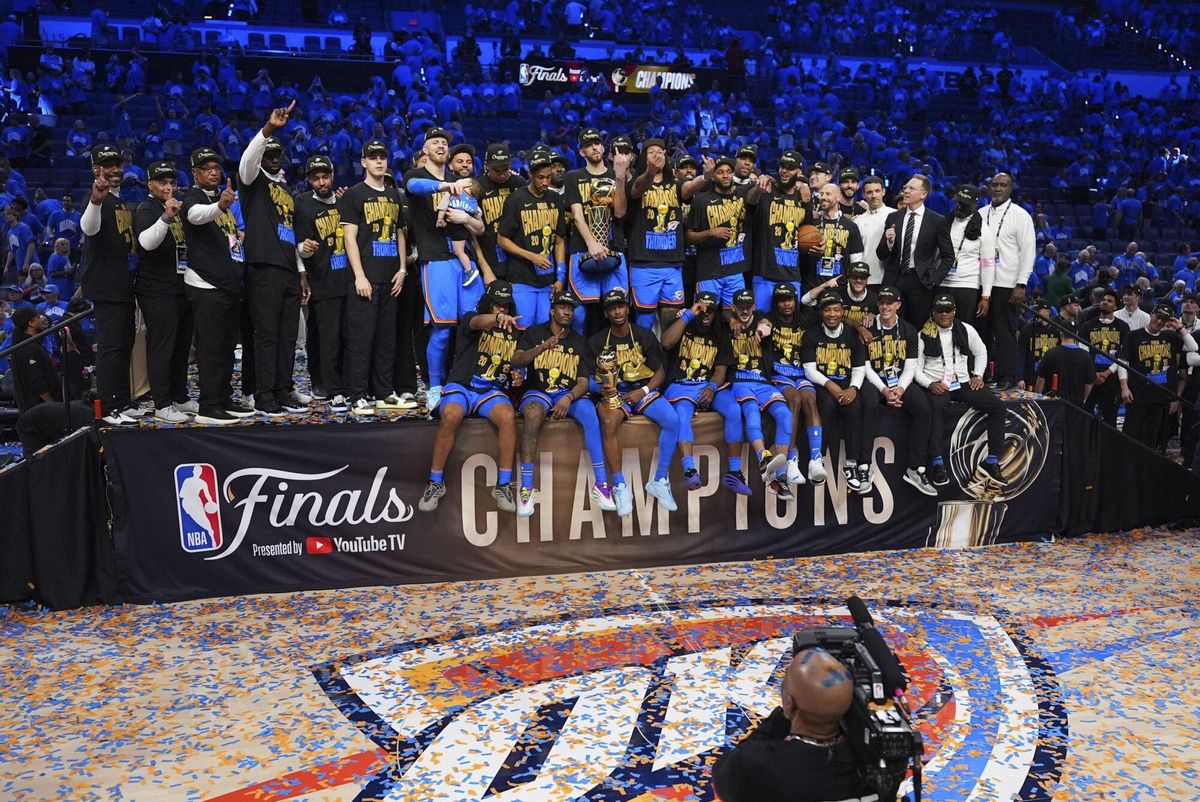 Oklahoma City Thunder players celebrate after winning the NBA basketball championship with a Game 7 victory against the Indiana Pacers Sunday, June 22, 2025, in Oklahoma City. (AP Photo/Julio Cortez)