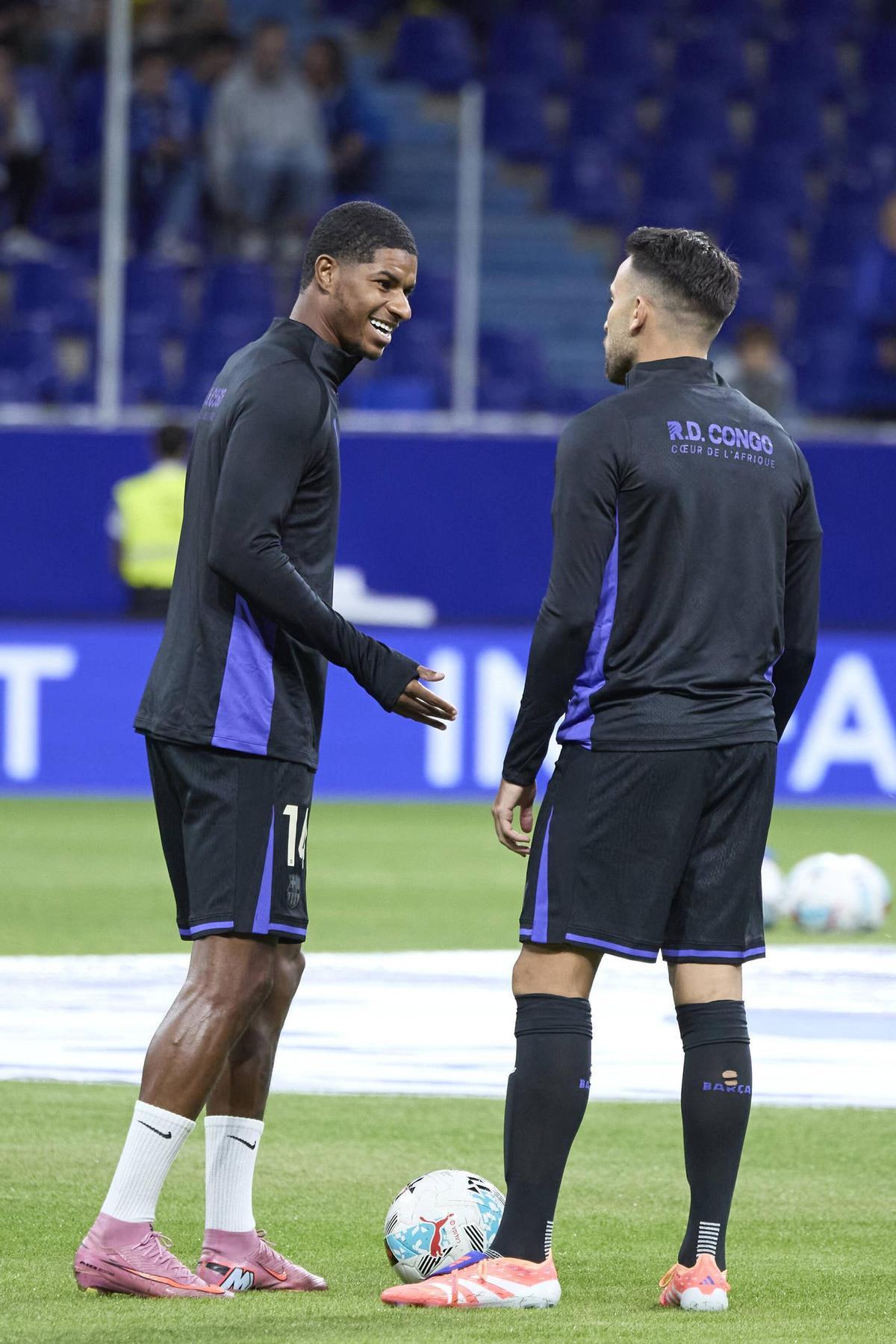 Rashford y Eric, en un calentamiento del Barça