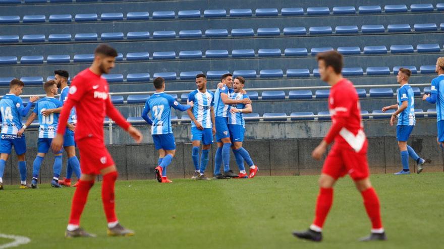 Los jugadores del Malagueño celebran un gol.