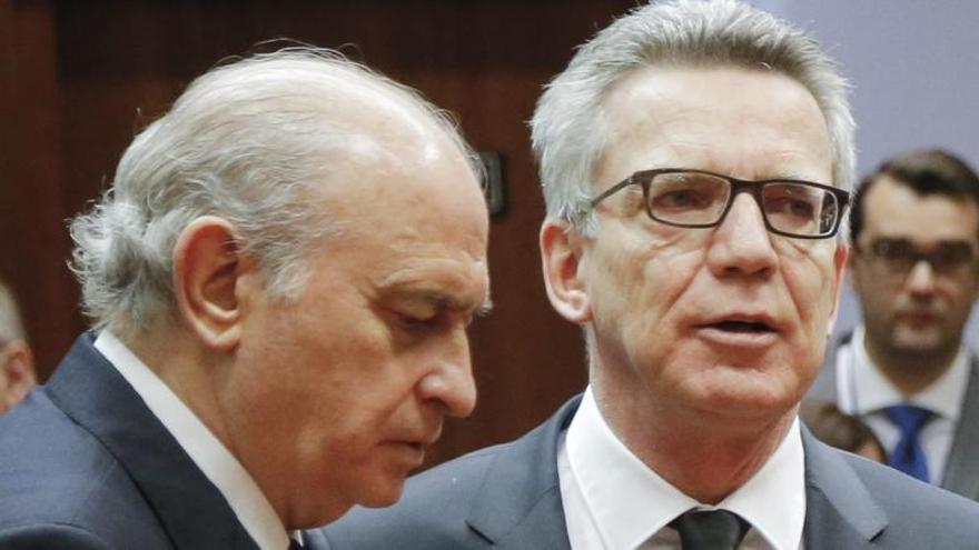 El ministro de Interior en funciones Jorge Fernández Díaz y el ministro del Interior alemán Thomas de Maiziere.