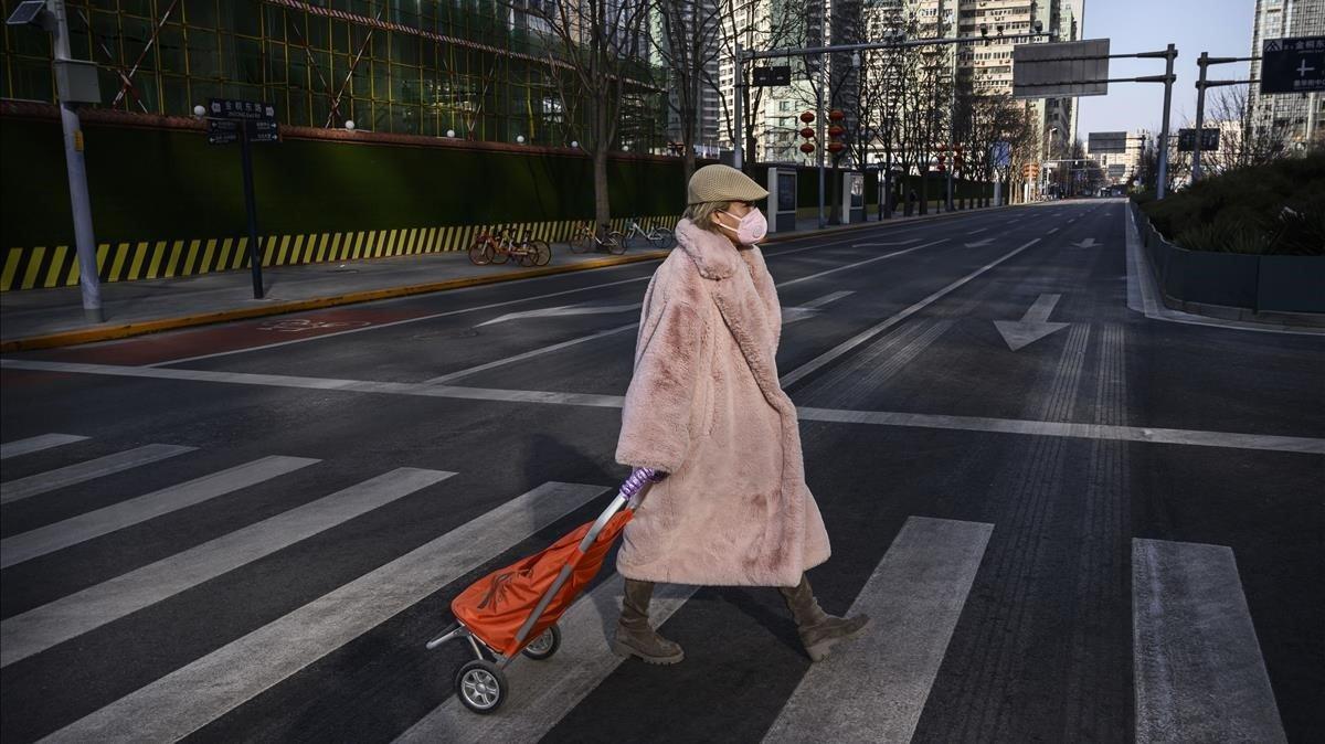 undefined52123196 beijing  china   february 03  a pedestrian wears a protectiv200203193838
