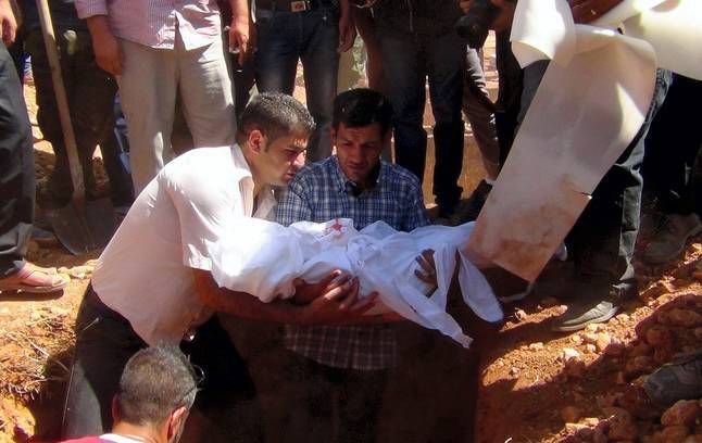 El pequeño Aylan, enterrado en Kobani