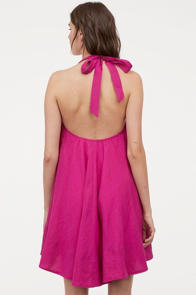 Vestido corto rosa con escote de pico y lazo, de las rebajas H&M