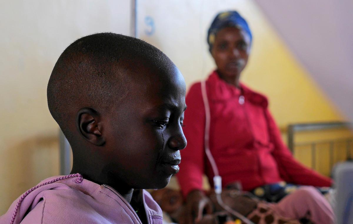 A sick boy admitted at Kabgayi hospital sobs in his hospital bed in south of Rwanda’s capital Kigali where Zipline, a California-based robotics company delivered their first blood to patients using a drone October 13, 2016. Picture taken October 13, 2016. REUTERS/James Akena