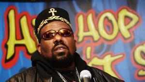 (FILES) Hip hop pioneer Afrika Bambaataa speaks during a press conference to announce the launch of The Smithsonians Hip-Hop Wont Stop: The Beat, The Rhymes, The Life at the Hilton Hotel February 28, 2006 in New York City. Groundbreaking US hip-hop artist and DJ Afrika Bambaataa, known for his 1982 hit Planet Rock, has died at age 68, his former record label said on April 9, 2026. With his passing, we reflect on his contributions to the genre and broader culture, which continue to this day, Tommy Boy Records said in an Instagram post alongside a picture of Bambaataa. (Photo by Scott Gries / Getty Images North America / AFP)