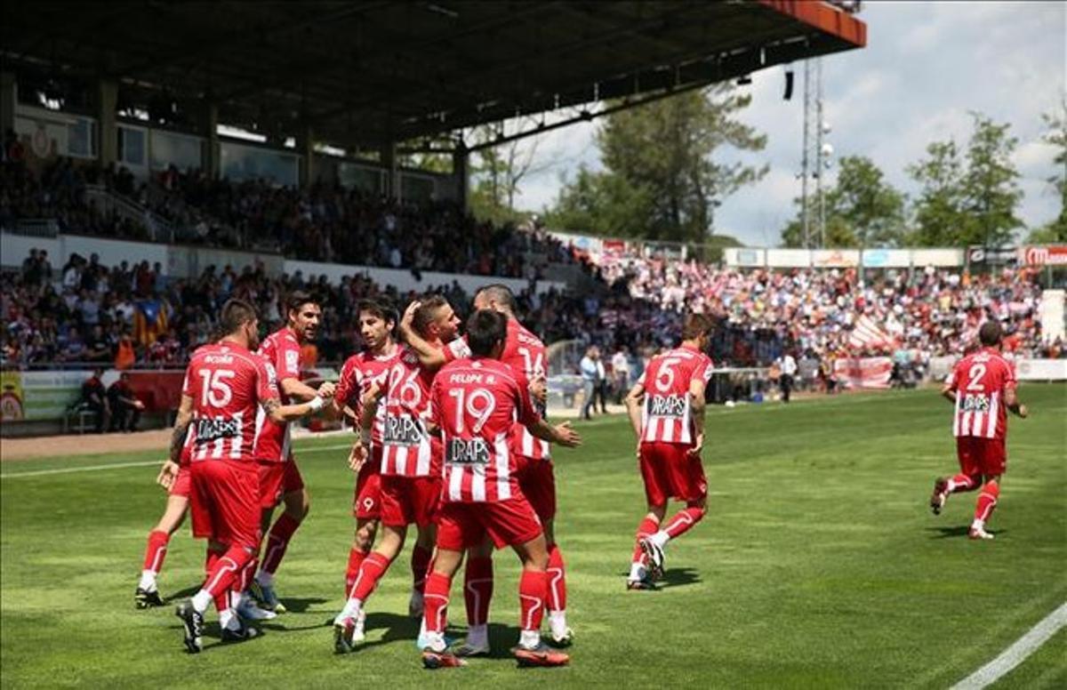 Els jugadors del Girona celebren un gol. Els jugadors del Girona celebren un gol.