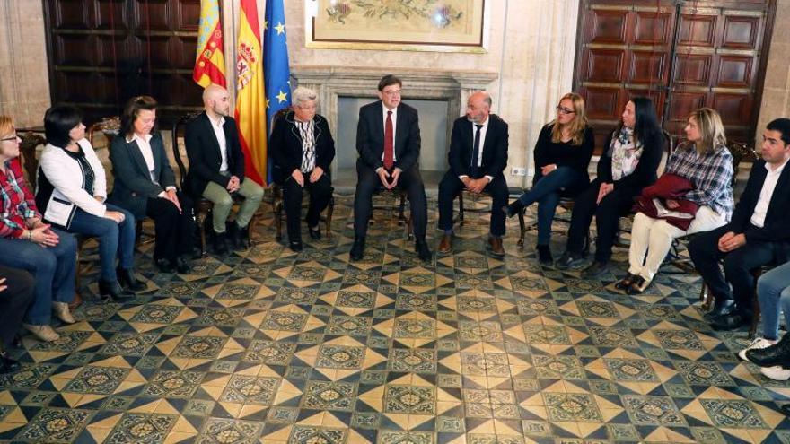 El presidente Ximo Puig en la reunión mantenida con los afectados en el Palau de la Generalitat.