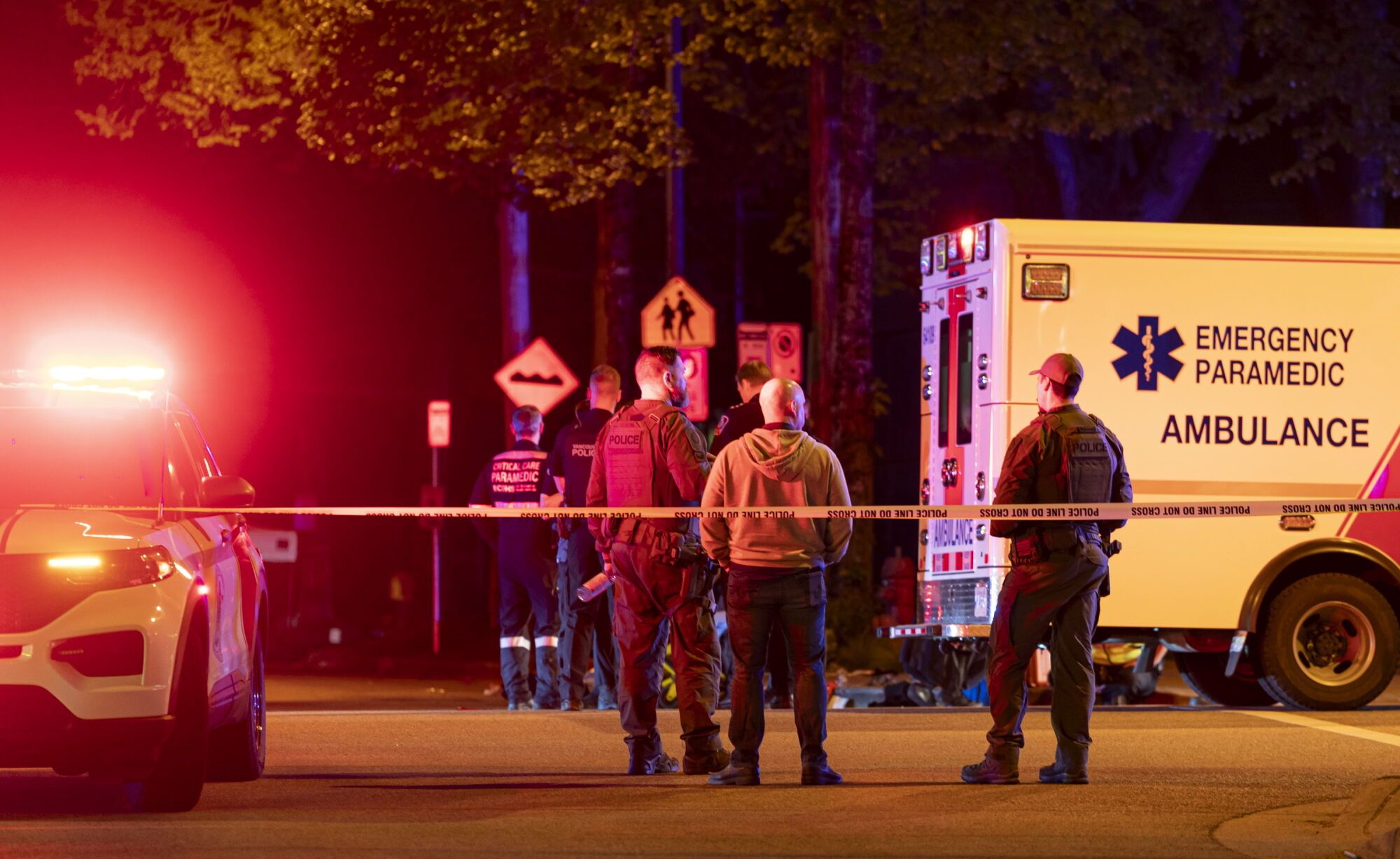 Vancouver police secure the scene after a car drove into a crowd at the Lapu Lapu Festival in Vancouver, British Columbia, Saturday April 26, 2025. (Rich Lam/The Canadian Press via AP). MANDATORY CREDIT