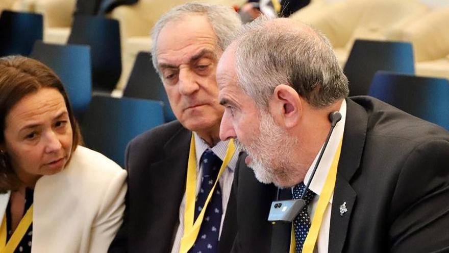 Paloma Saborido, Luis Merino y José Carlos Garín, durante el congreso en Lugano.