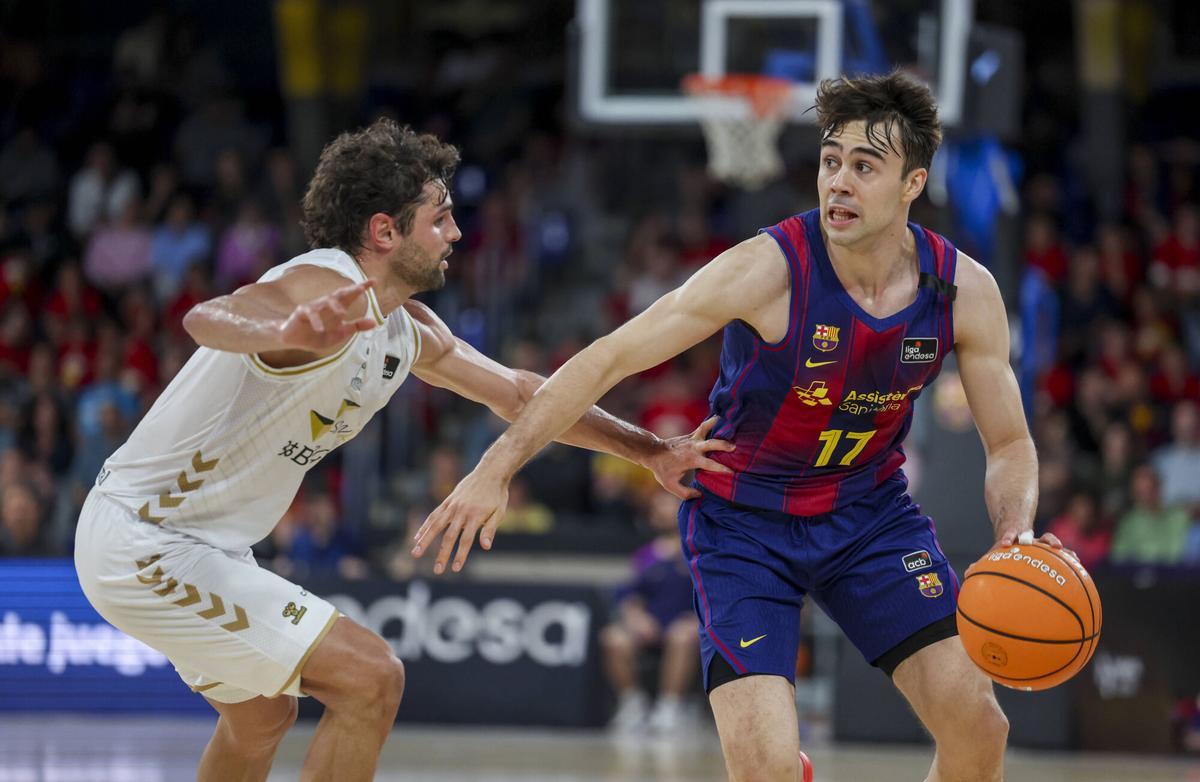 Juan Núñez frente a Raulzinho Neto durante el Barça-Burgos.