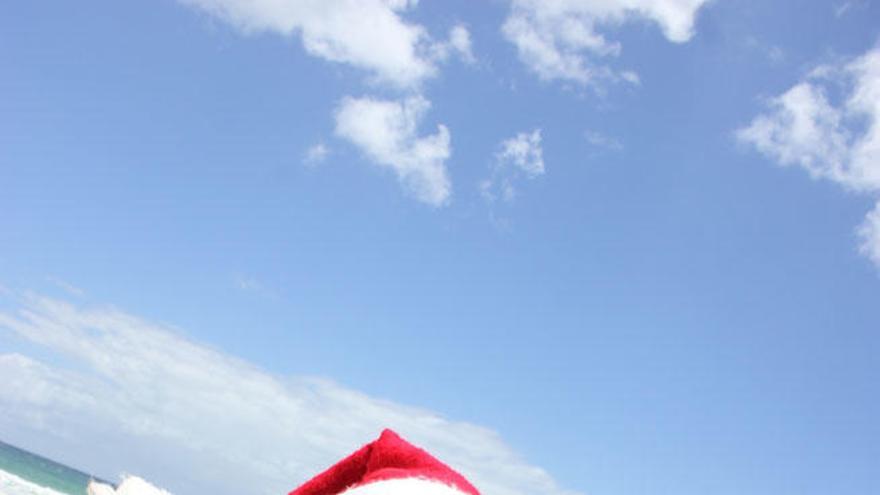 Nathalie Arcos y su novio Fran, celebrando la pasada Navidad en una playa australiana.