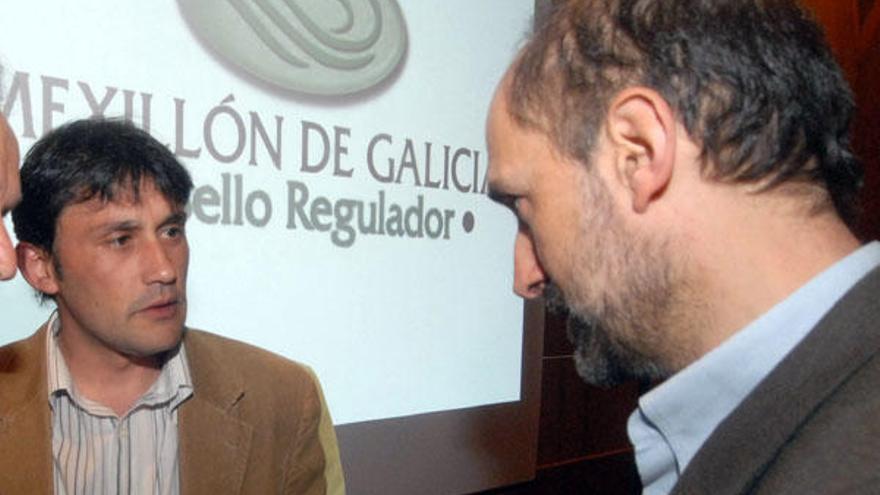 Ramón Dios (i.) y el gerente del Consello, Alfonso Alcaide.
