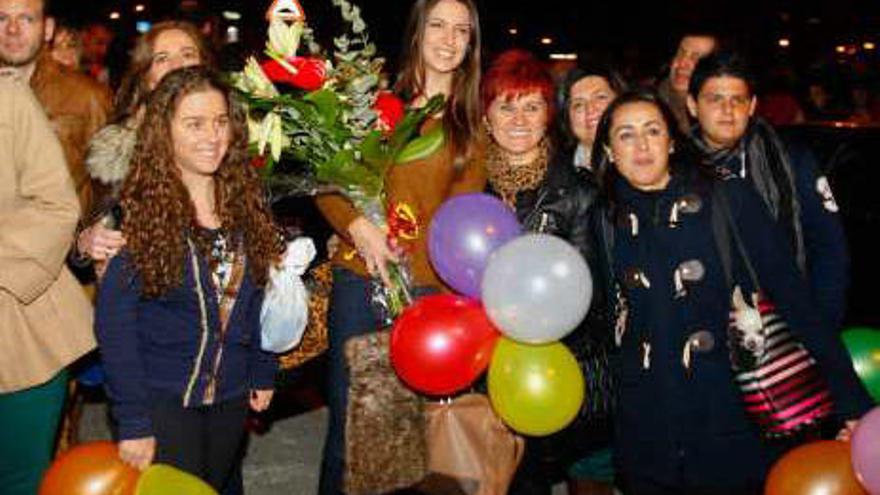 Del desfile con el traje de alicantina a la plantà en Fitur