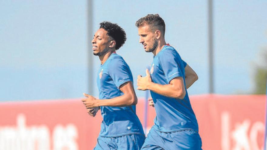 Mojica i Stuani, en un entrenament amb el Girona