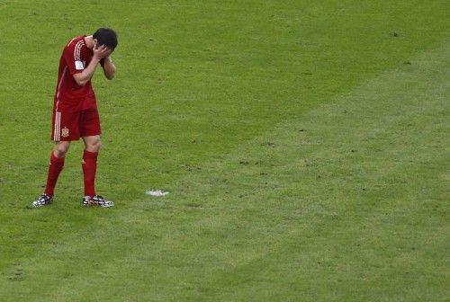 Durante y después del partido, los rostros de los futbolistas españoles transmitían la desilusión.