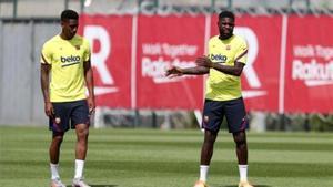 Junior y Umtiti en un entrenamiento con el Fútbol Club Barcelona