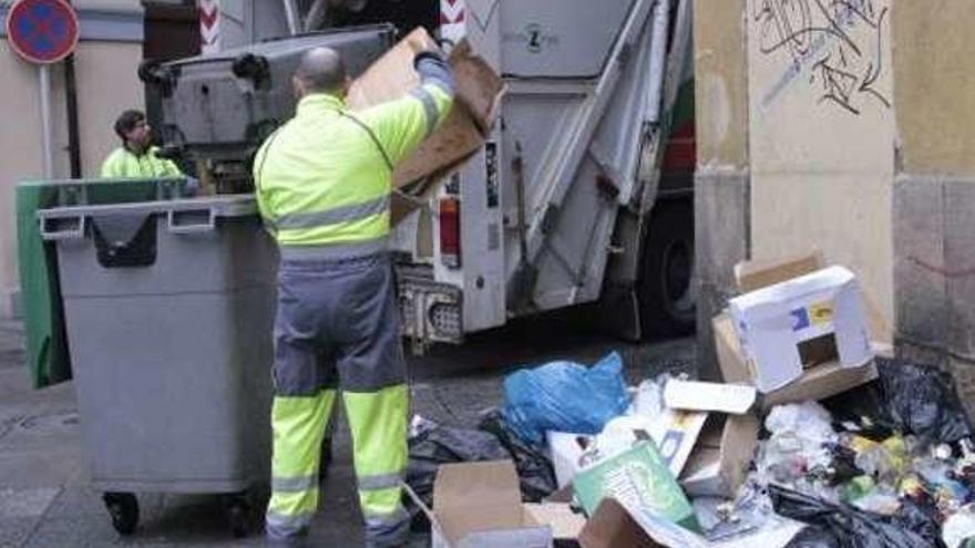 Trabajadores de recogida de basuras.