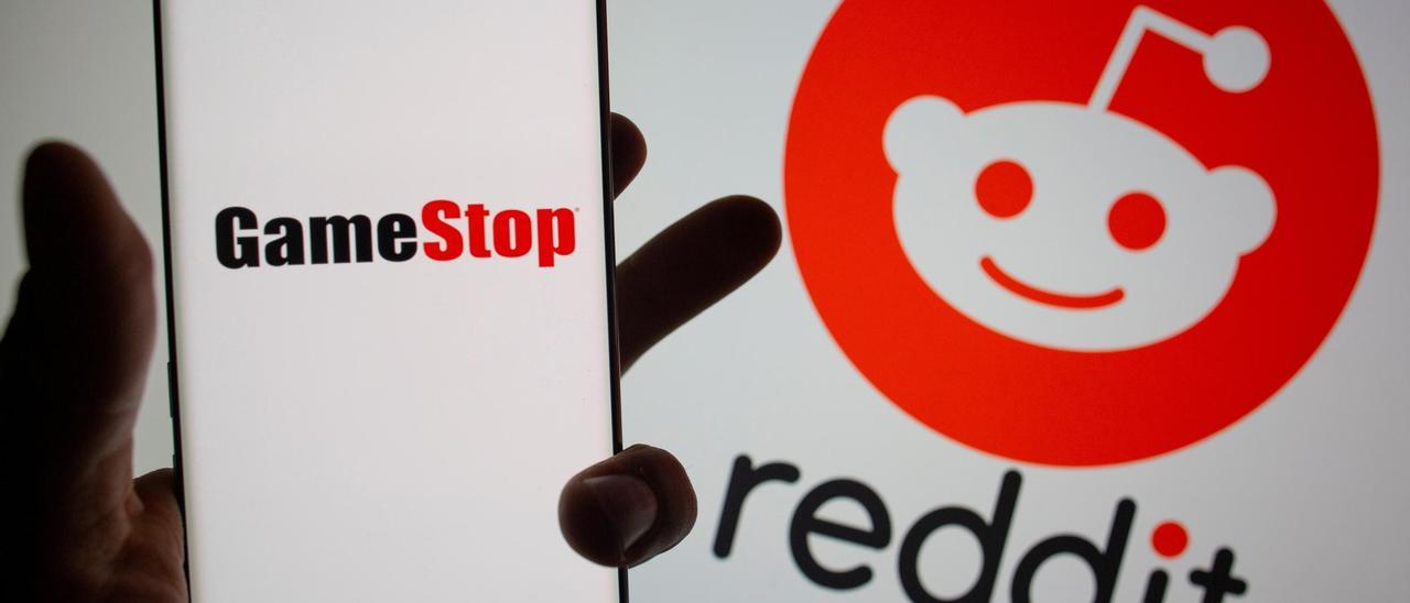 FILE PHOTO: GameStop logo is seen in front of displayed Reddit logo in this illustration