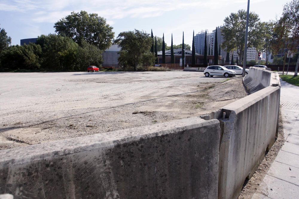 Tanquen el solar situat entre l'Auditori i el pont de Fontajau