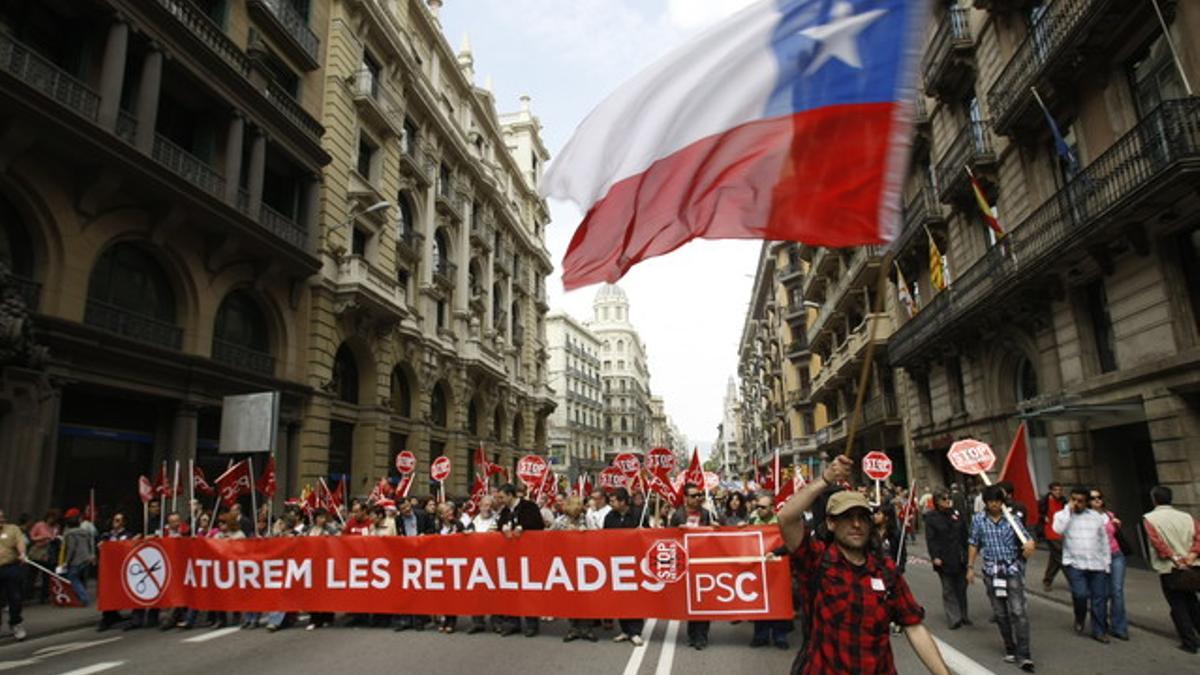 Imagen de la manifestación que ha recorrido este domingo, Primero de Mayo, el centro de Barcelona.