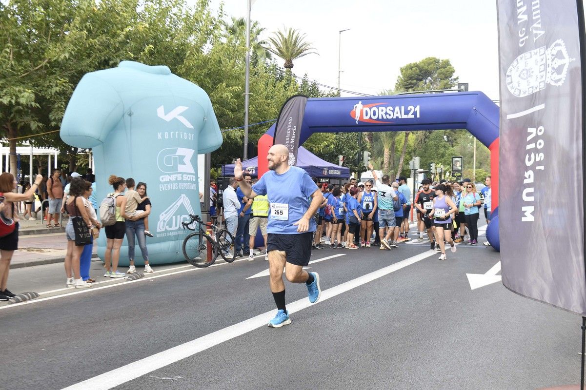 La carrera y marcha Solidaria Asteamur, en imágenes