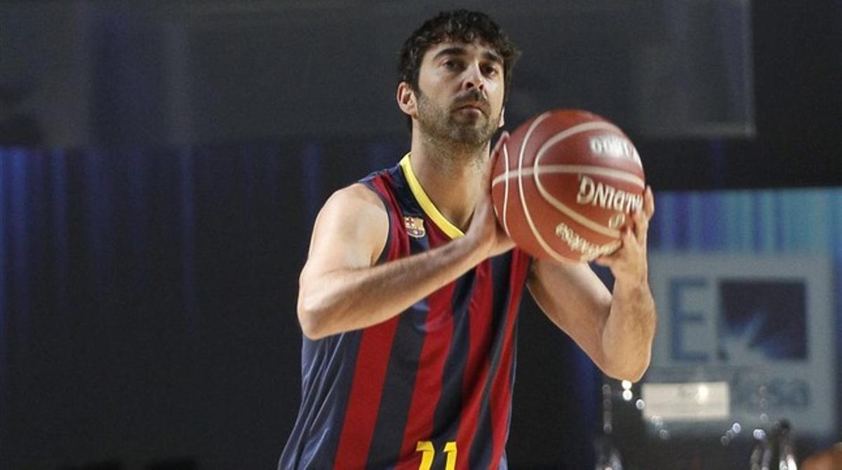 El jugador del Barcelona Juan Carlos Navarro llança a cistella. El jugador del Barcelona Juan Carlos Navarro llança a cistella.