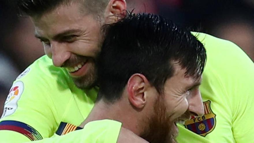 Gerard Piqué y Leo Messi