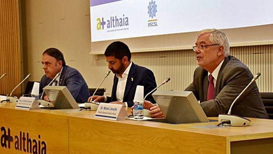 Valentí Junyent, Chakir el Homrani i Manel Jovells, en la inauguració