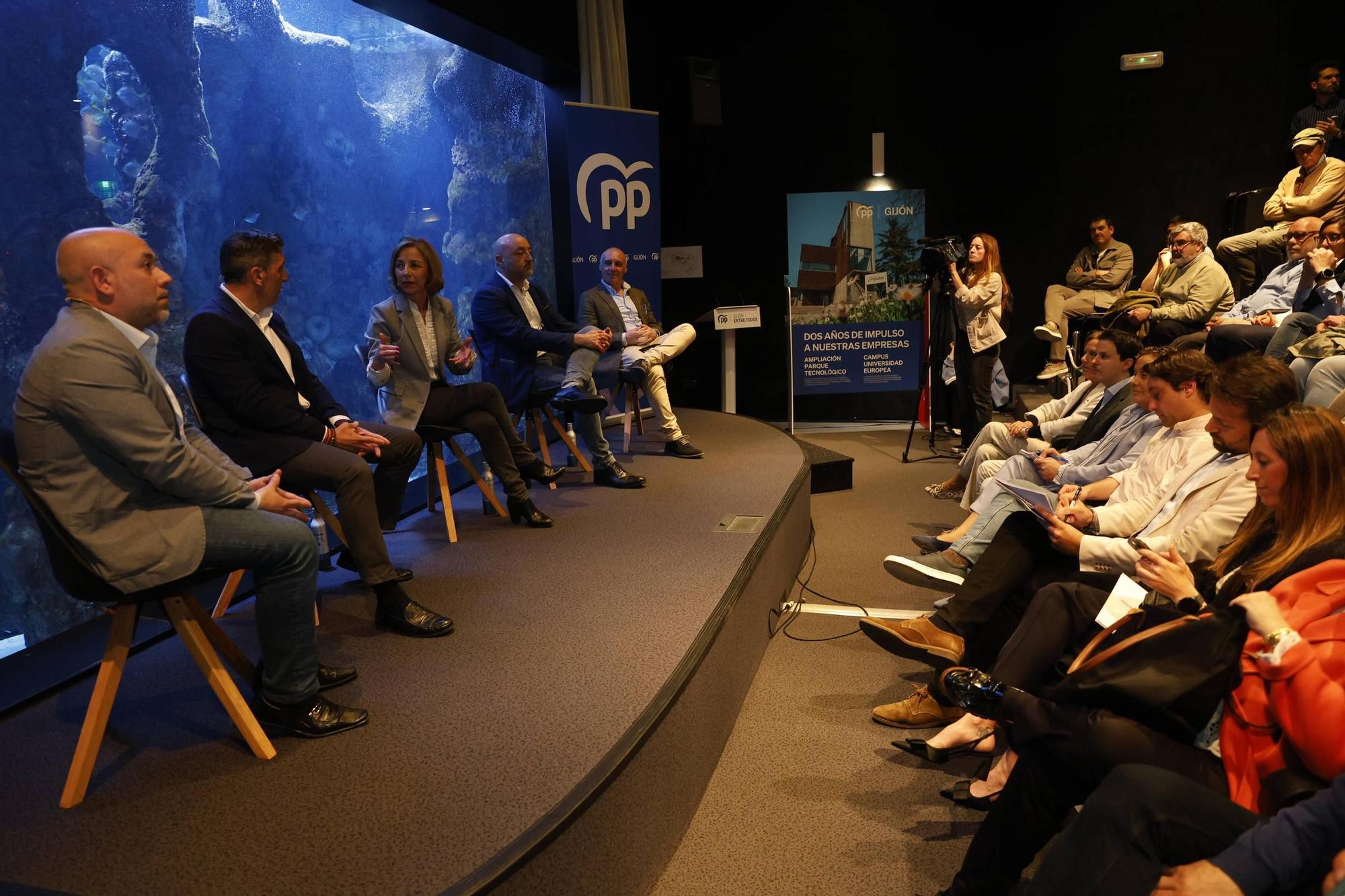 La convención del PP de Gijón por los dos años de gobierno, en imágenes